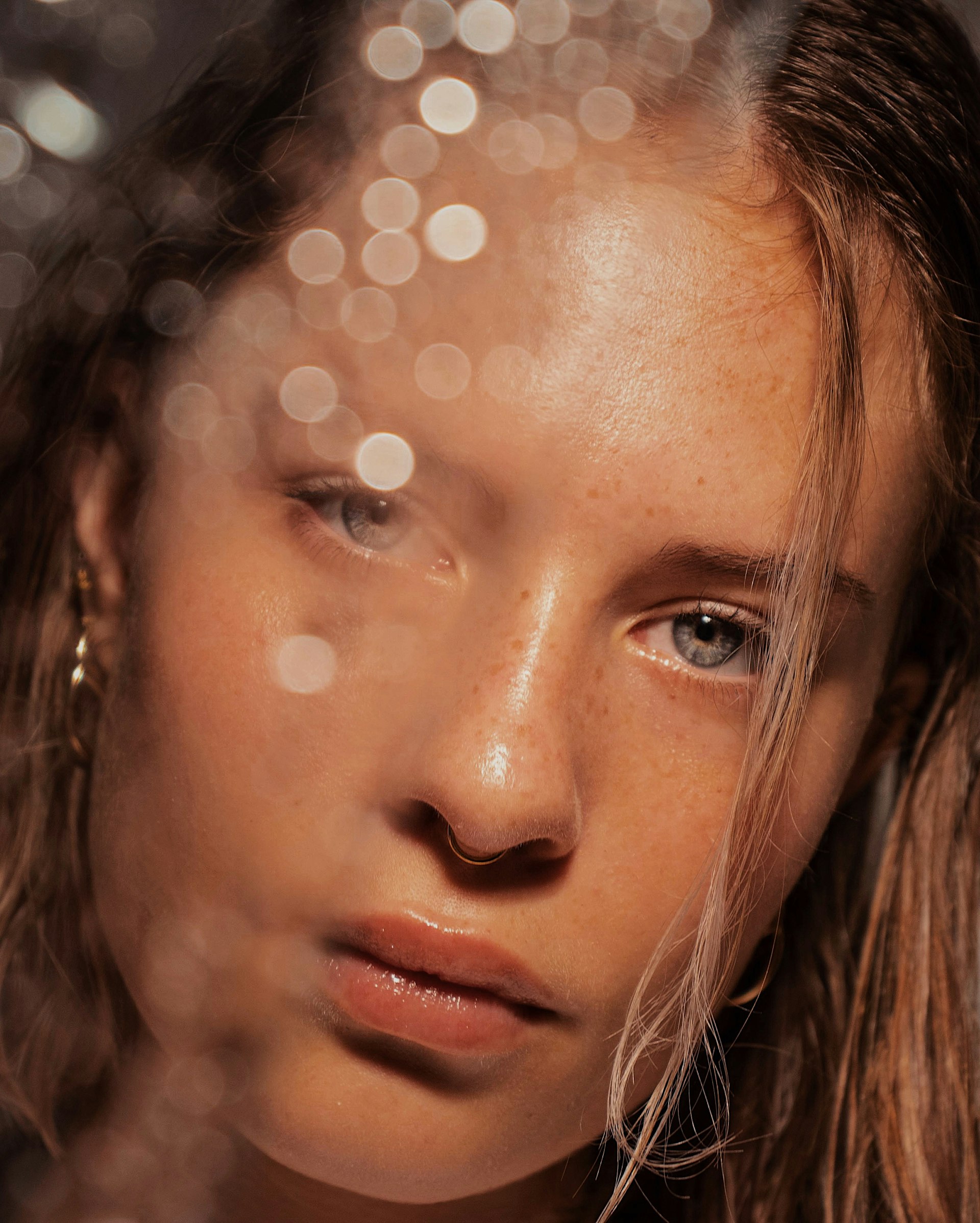 Close portrait of a woman with radiant, healthy skin